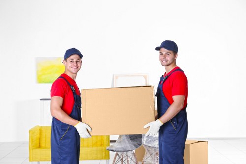 Commercial relocation team handling office furniture during office removals in Hainault