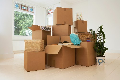 Packed office desks and IT equipment prepared for removals in Hainault